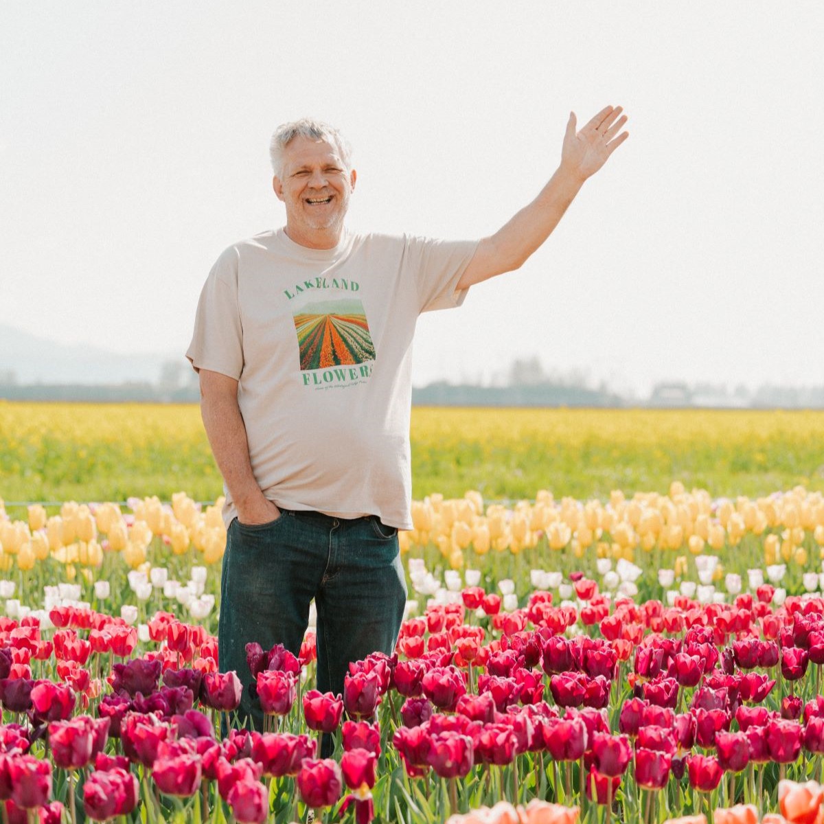 Owner and operator of the Abbotsford Tulip Festival and Lakeland Flowers Nick Warmerdam standing in a field of flowers in Abbotsford, BC